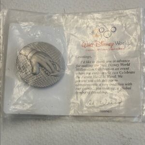 Disney Silver Hand-in-Hand Commemorative Pin